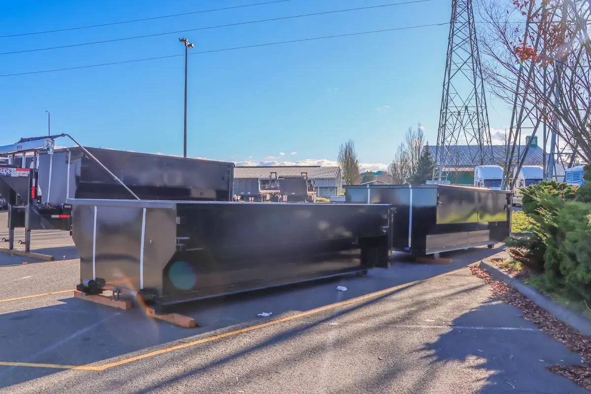 Roll-off dumpster ready for waste disposal at job site for 4 Yard Dumpster Rental in Henderson